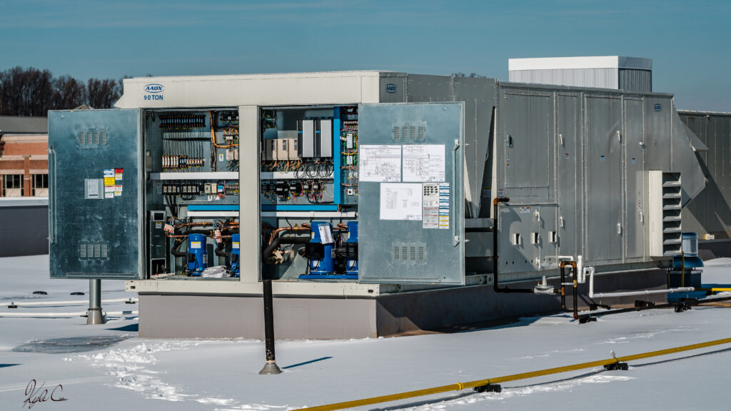 Indoor shooting range ventilation system with engineered ductwork and HEPA filtration